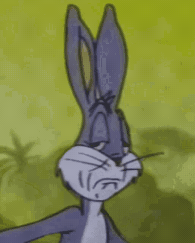 Bugs Bunny Is Making A Sad Face With His Eyes Closed And His Ears Up . GIF