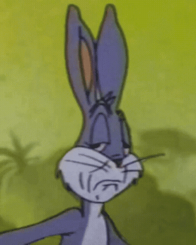 Bugs Bunny Is Making A Sad Face With His Eyes Closed In A Close Up Of His Face . GIF