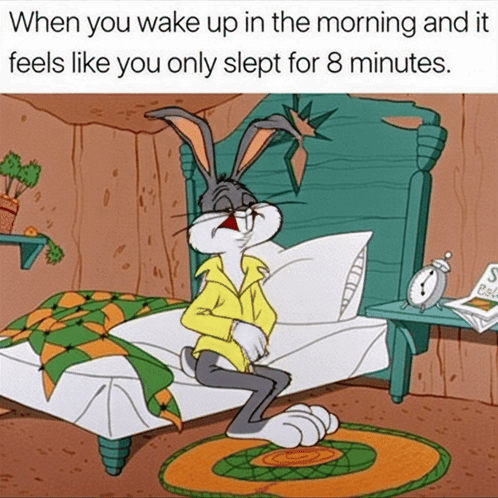 Bugs Bunny Is Sitting On A Bed With The Caption When You Wake Up In The Morning GIF