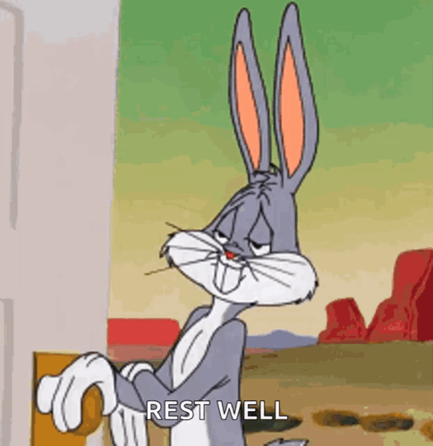 Bugs Bunny Is Standing In Front Of A Door And Says Rest Well . GIF