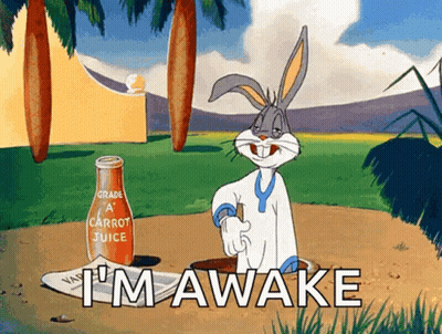 Bugs Bunny Is Standing Next To A Bottle Of Carrot Juice That Says I 'M Awake GIF