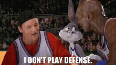 Bugs Bunny Is Talking To A Man On A Basketball Court And Says `` I Do N't Play Defense '' . GIF