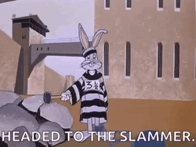 Bugs Bunny Is Wearing A Jail Uniform And Holding A Hammer In A Cartoon . GIF