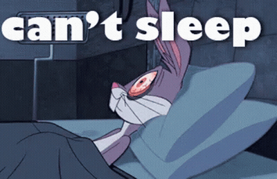 Bugs Bunny Lying In Bed Can't Sleep GIF
