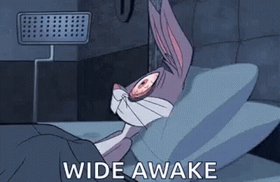 Bugs Bunny Lying In Bed Wide-Eyed GIF