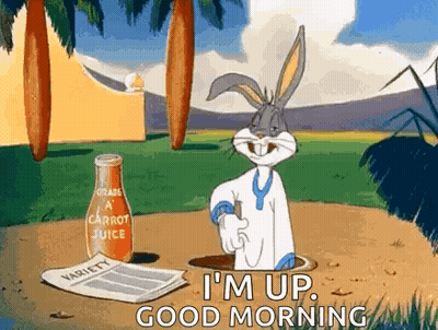 Bugs Bunny Next To Carrot Juice Bottle GIF