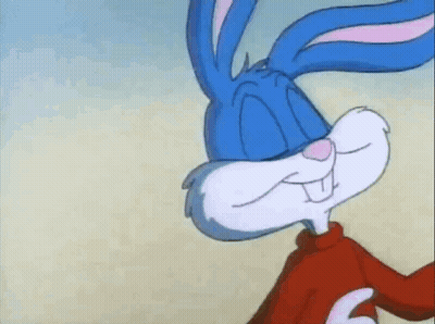 Bugs Bunny Smiling In Red Sweater On Beach GIF