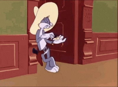 Bugs Bunny Wearing Cowboy Hat Holding Bread GIF