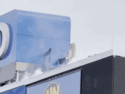 Building With Blue U.S. Mail Sign GIF