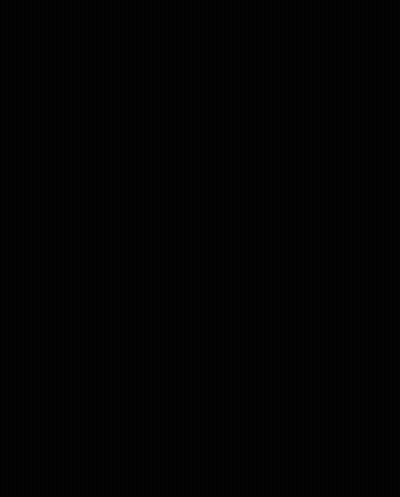 Building With Center Sign In Front Of Mountains GIF