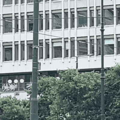 Building With Many Windows And Street Light GIF
