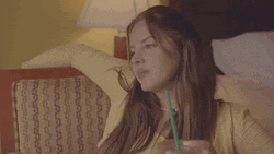 Bummed Lana Del Rey Sitting On Couch GIF