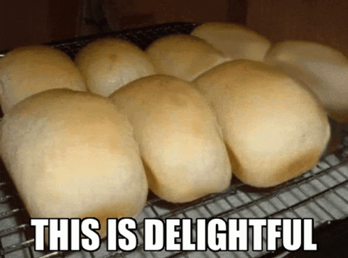 Bunch Of Rolls On Cooling Rack GIF