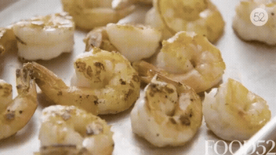 Bunch Of Shrimp On Pan Saying Foods52 GIF