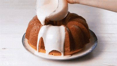 Bundt Cake With Icing Being Poured GIF