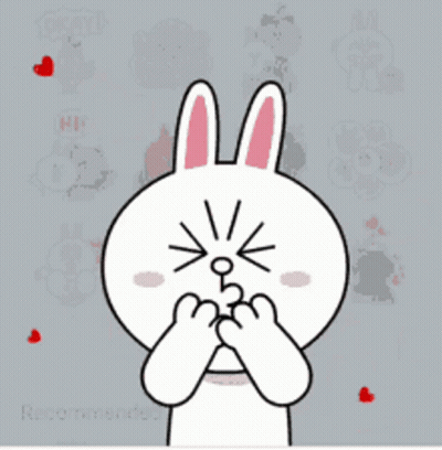 Bunny Covering Face With Hearts GIF