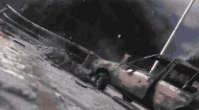 Burnt Out Car On Side Of Road GIF