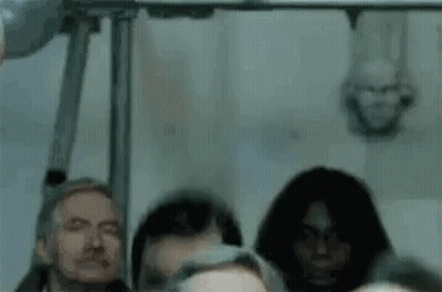 Bus Passengers With Heads Hanging GIF