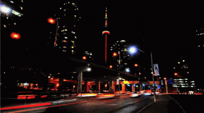 Busy City Street At Night GIF