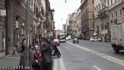 Busy City Street With Rescue911.de GIF
