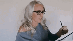 Busy Woman Taking Notes GIF