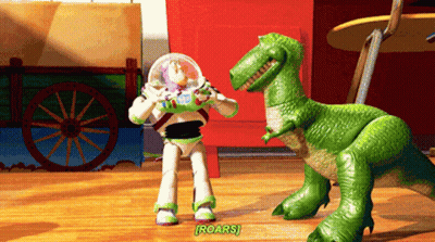 Buzz Lightyear Next To Green Toy Dinosaur Saying Roars GIF