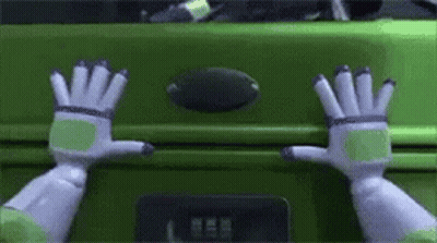 Buzz Lightyear Reaching Into Green Suitcase GIF