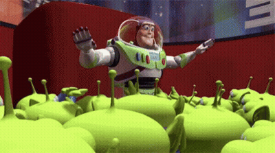 Buzz Lightyear Surrounded By Green Aliens GIF