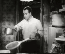 C.C. 'Bud' Baxter Transferring Pasta GIF