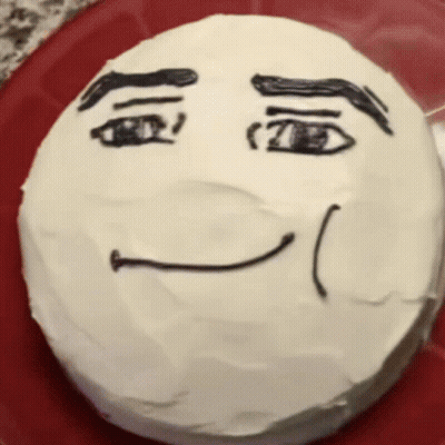 Cake With Face Drawn On It GIF