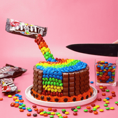 Cake With M&M's Candy Poured On Top GIF