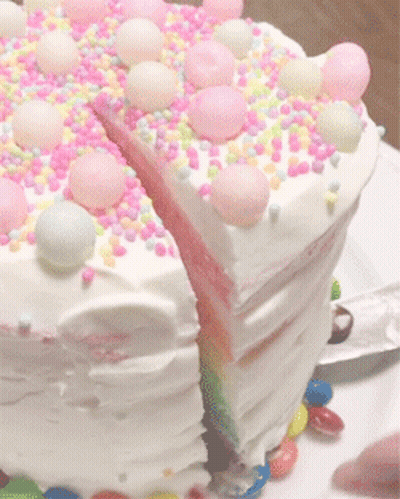 Cake With Slice Taken Out And Sprinkles GIF