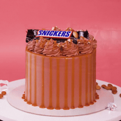 Cake With Snickers On Top GIF
