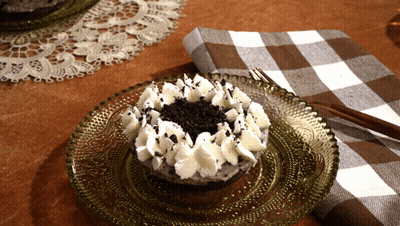 Cake With Whipped Cream And Chocolate Shavings GIF