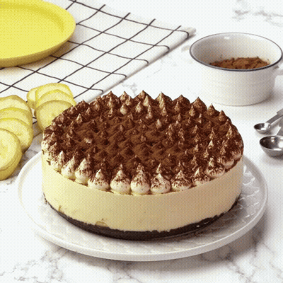 Cake With Whipped Cream And Chocolate Sprinkles GIF