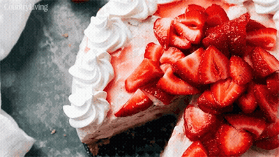 Cake With Whipped Cream And Strawberries With Piece Taken Out GIF