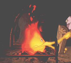 Calcifer Eating Up A Log GIF