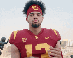 Caleb Williams Tossing The Football GIF