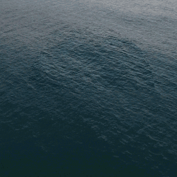 Calm Waves In The Center Of The Ocean GIF