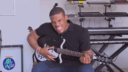 Cam Newton Playing Guitar GIF