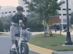 Cam Newton Riding Electric Bike GIF