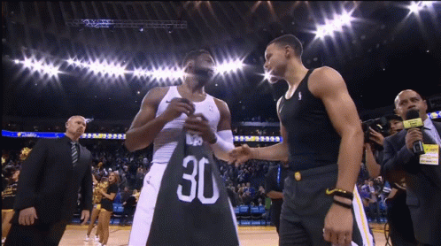 Cameraman Photographing Two Basketball Players GIF