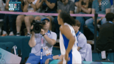 Cameraman Taking Picture Of Basketball Game At Olympics GIF