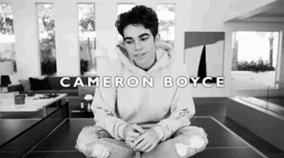 Cameron Boyce Sitting On Ping Pong Table GIF