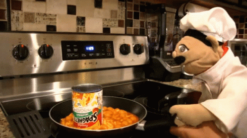 Can Of Spaghetti In Pan On Stove GIF