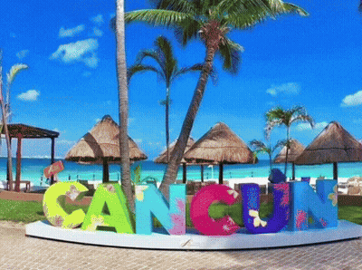 Cancun Sign On Beach With Palms GIF