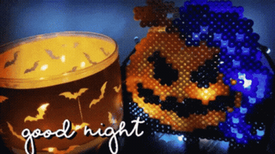 Candle And Pumpkin Saying Good Night GIF
