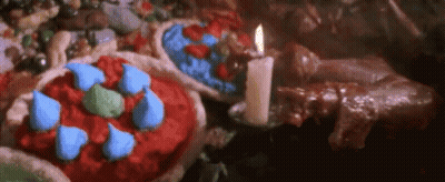 Candle Sitting Next To Pies GIF