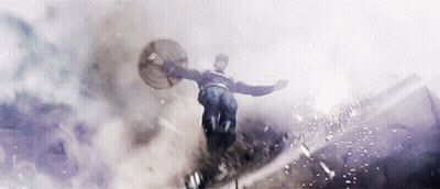 Captain America Is Flying Through The Air With A Shield . GIF