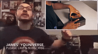Captain America Shirt Man Talks Someone In Box GIF